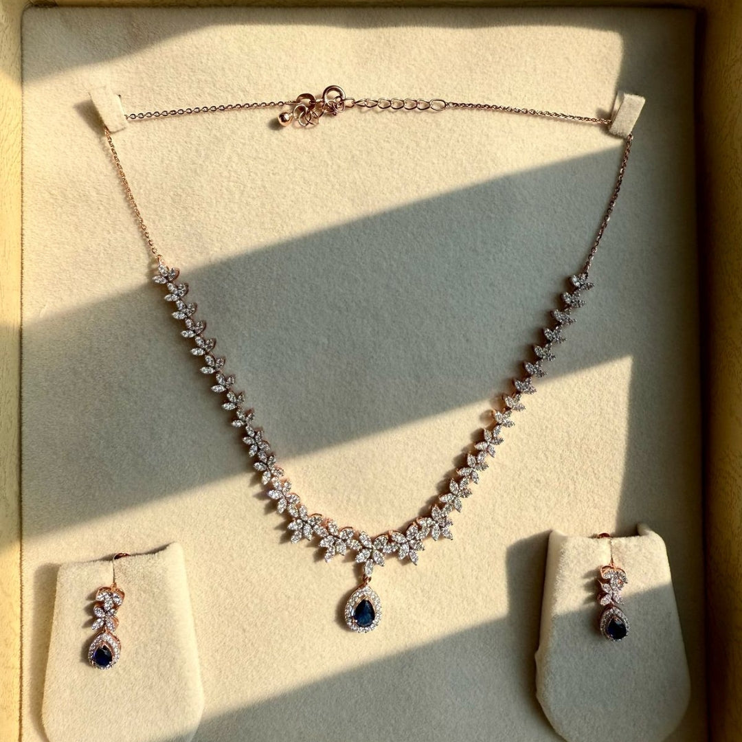 Dazzling Diamond Necklace Set With Blue Pear Gem