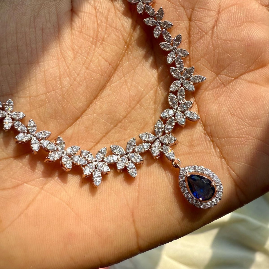 Dazzling Diamond Necklace Set With Blue Pear Gem