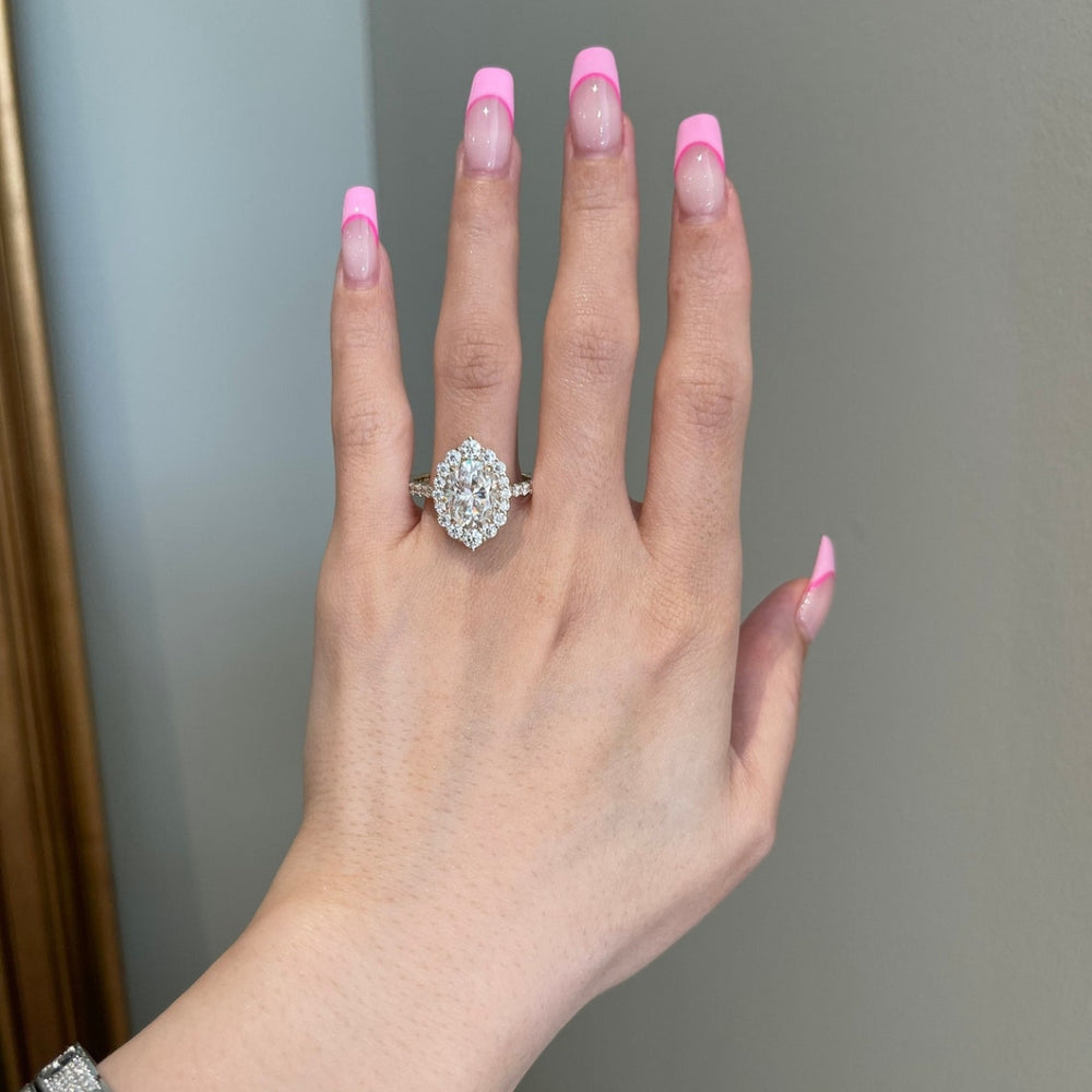 Oval diamond engagement ring halo