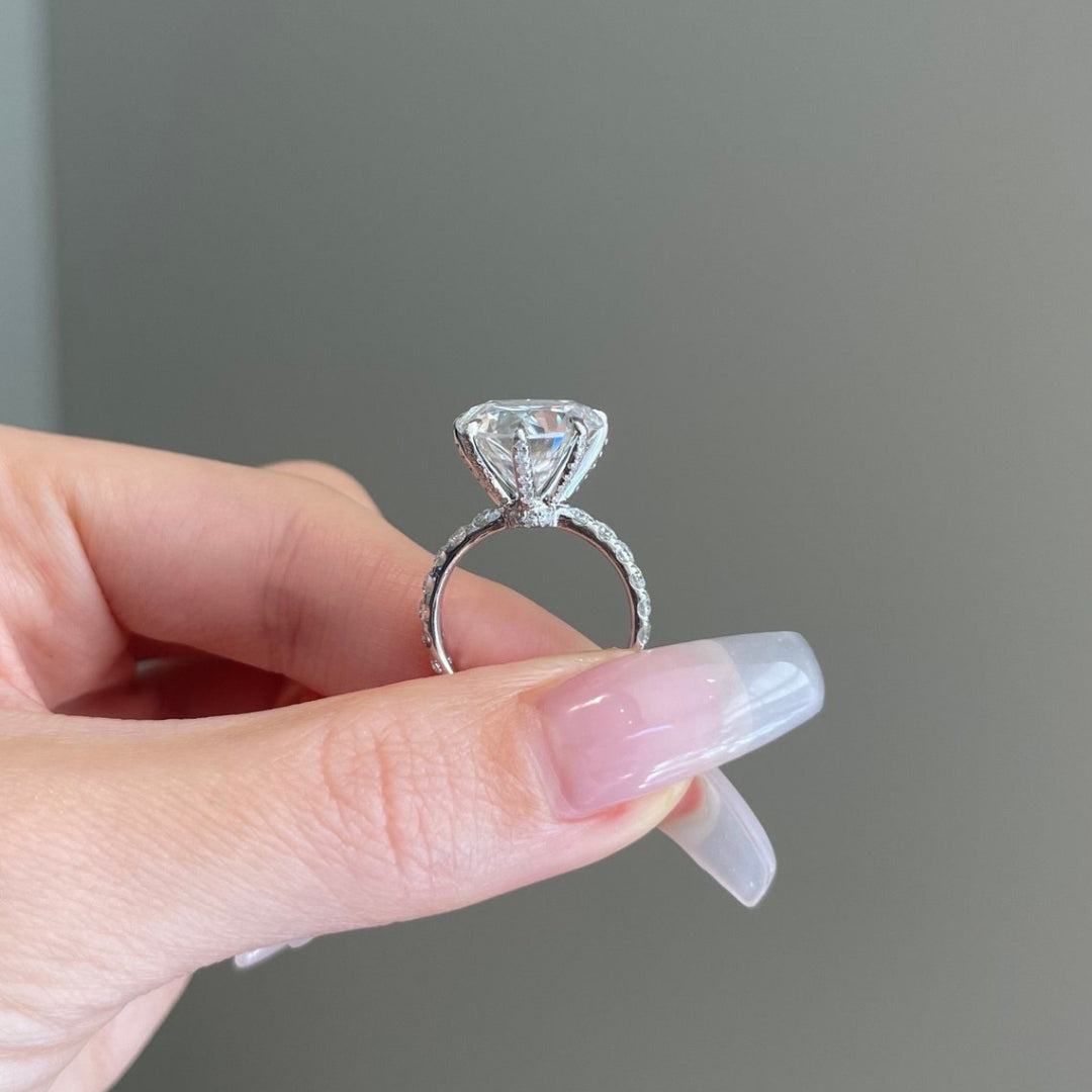White heart diamond with round side stone