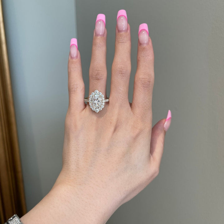 Oval halo white diamond ring