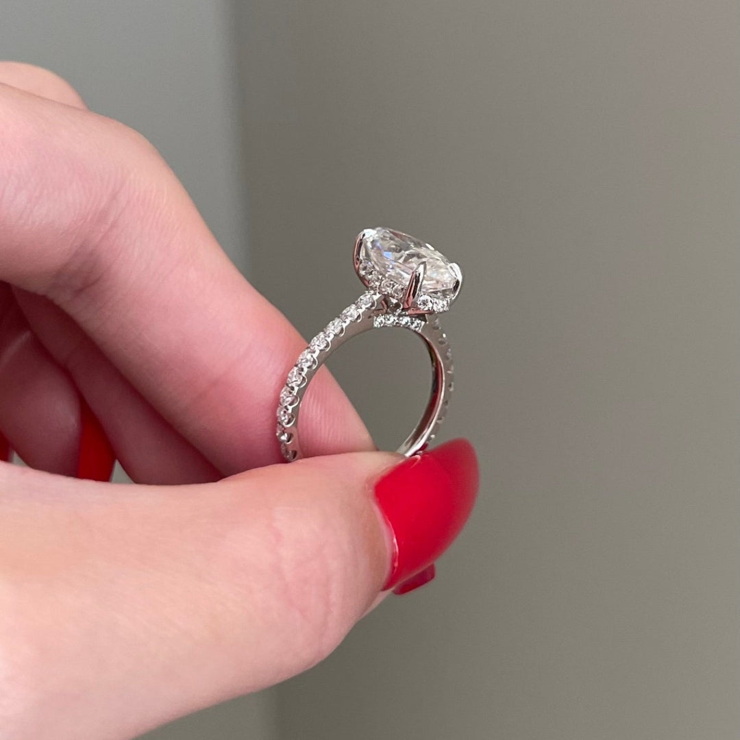 Marquise ring with round accent stones