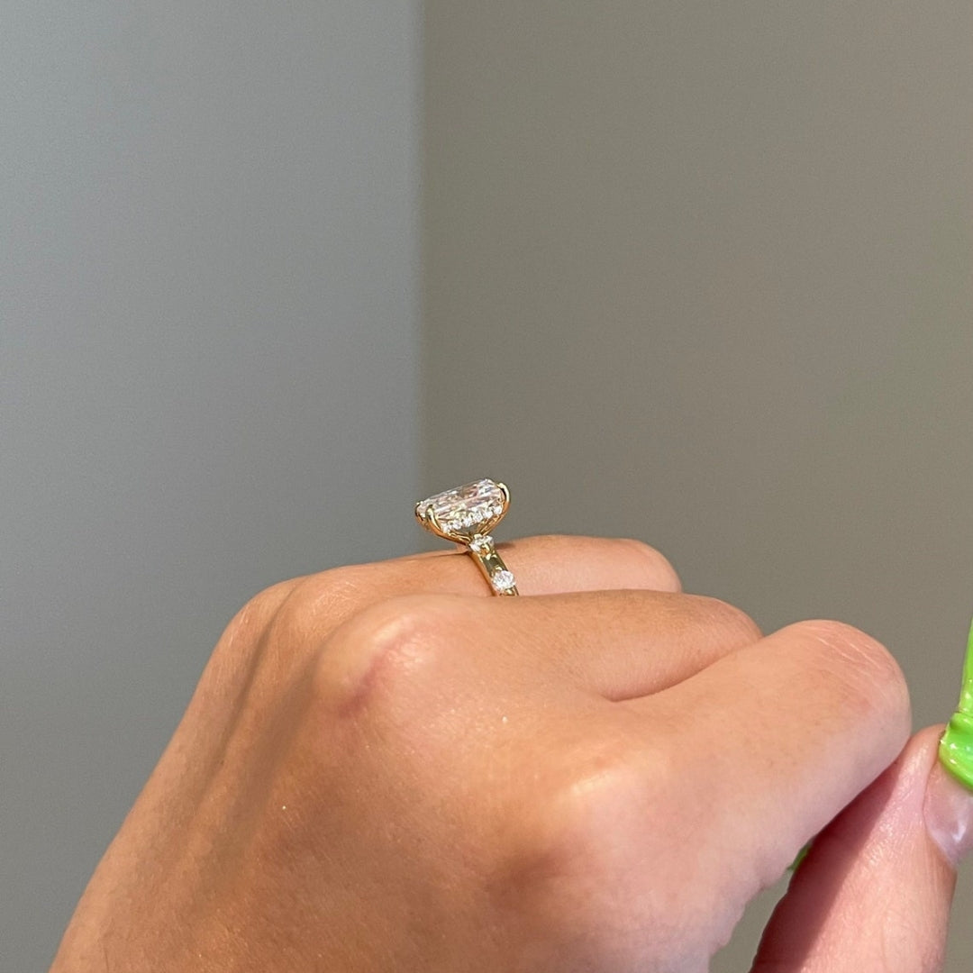 Hidden halo radiant engagement ring