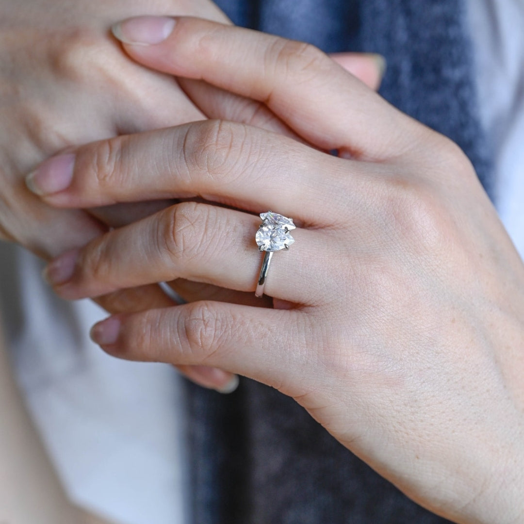 Marquise diamond ring with pear side stones