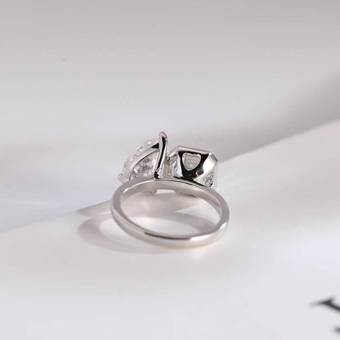 Asscher diamond ring with pear accents