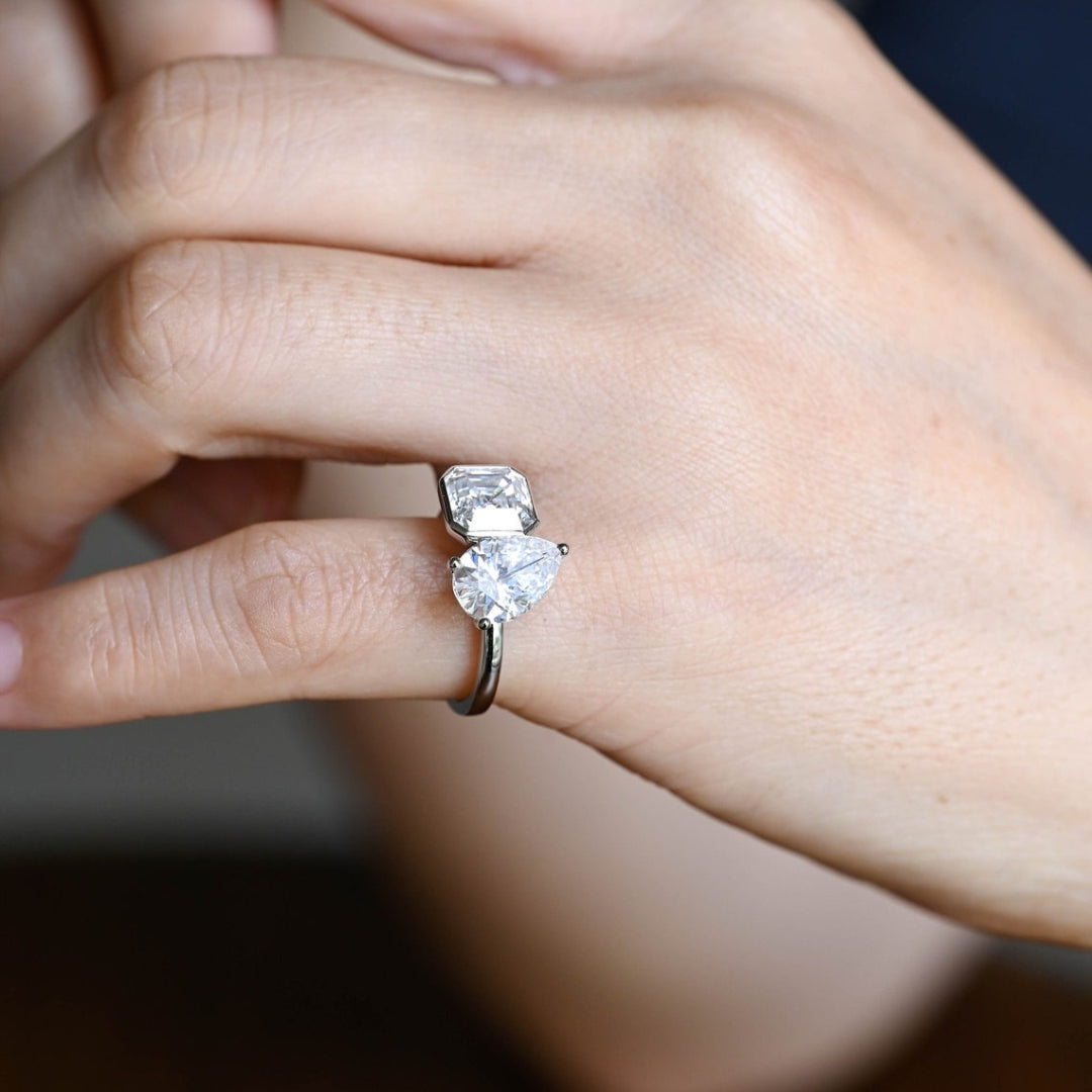 Asscher two stone ring pear sides