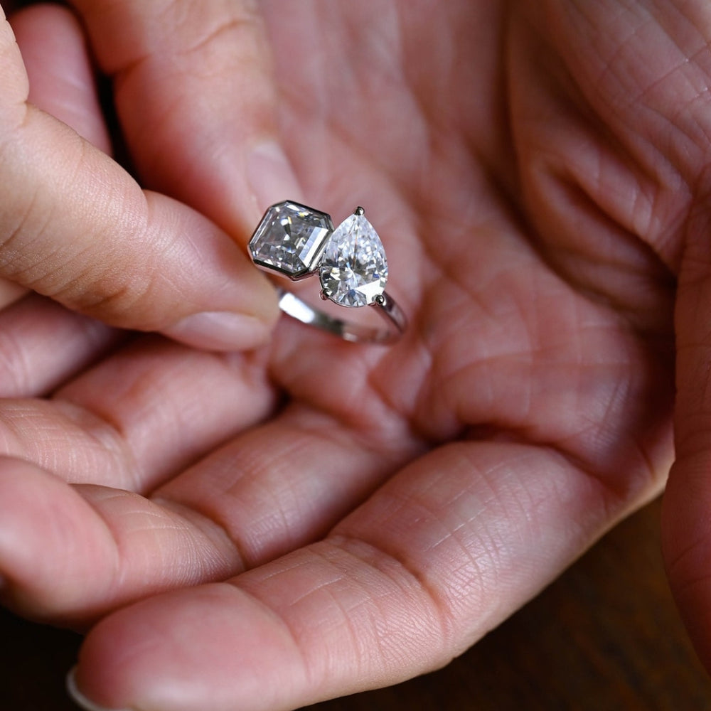 Asscher engagement ring pear side stones