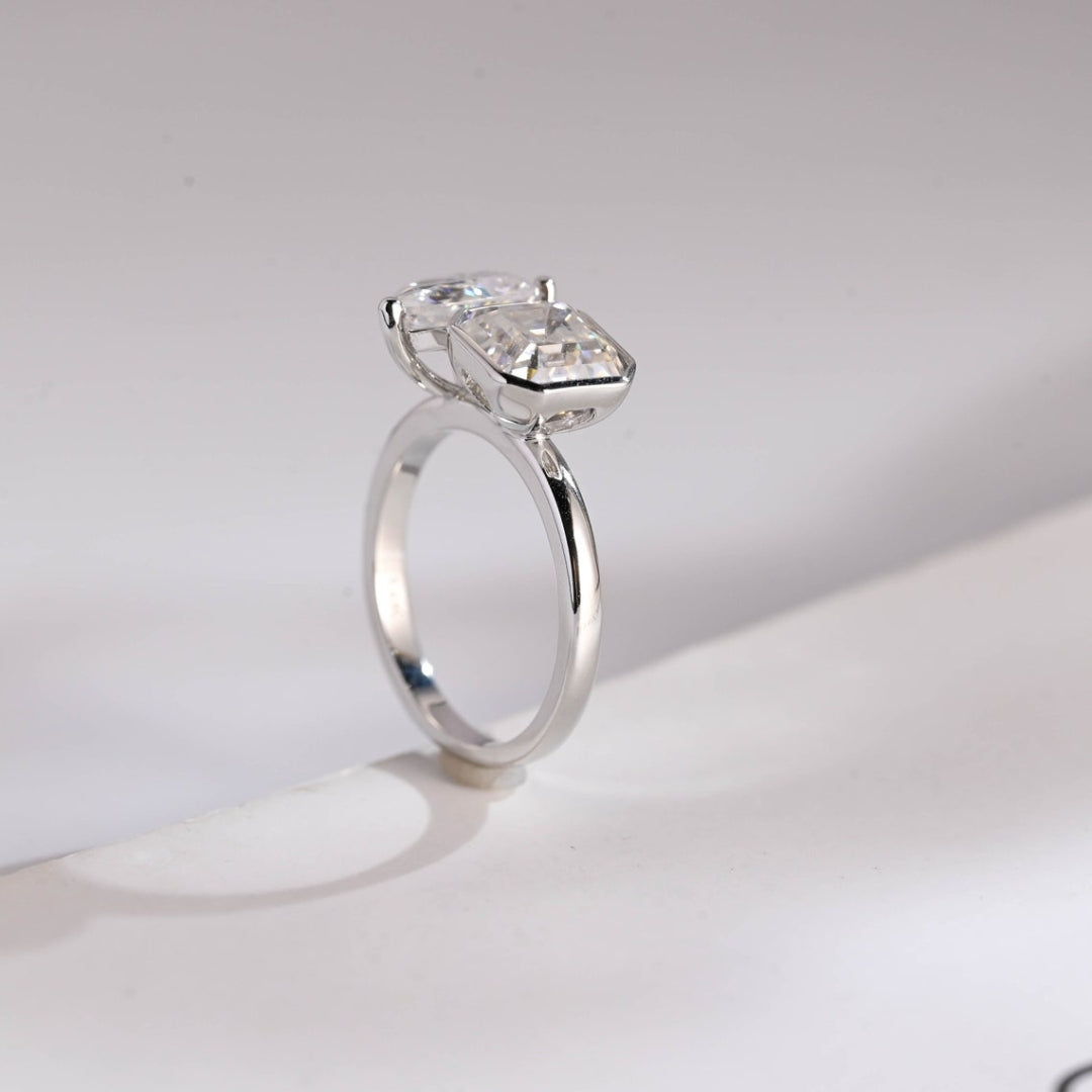 Asscher cut cathedral setting with pear sides
