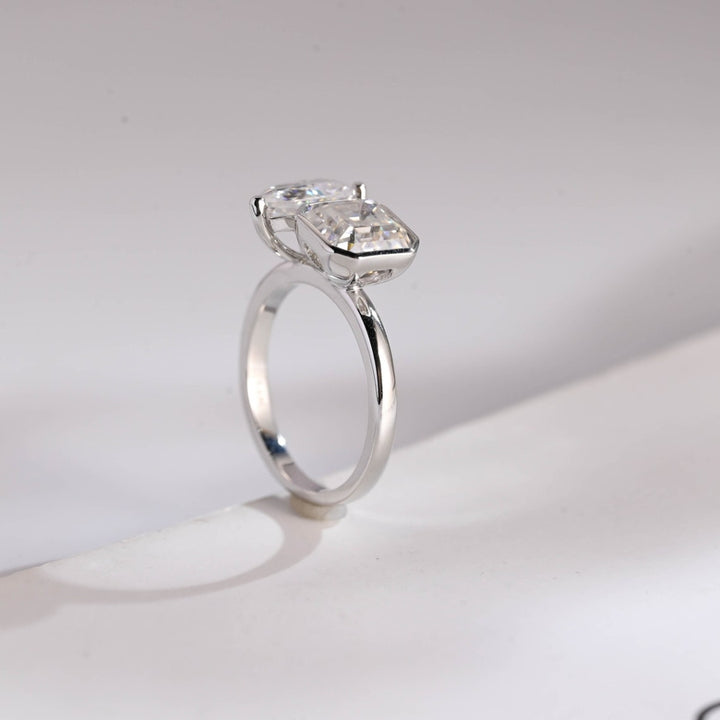 Asscher cut cathedral setting with pear sides
