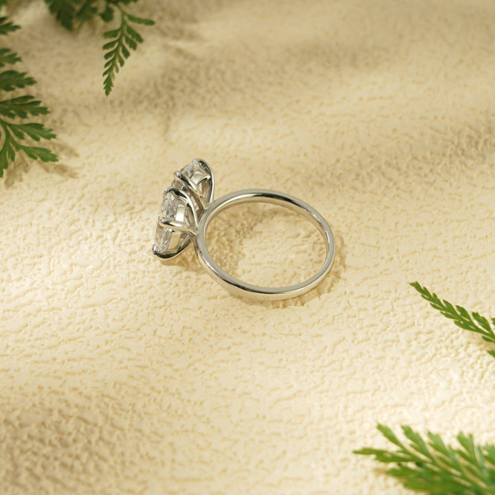 Two pear solitaire ring