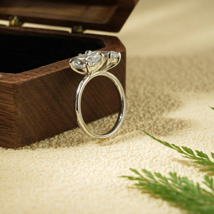 Pear shaped diamond bypass ring
