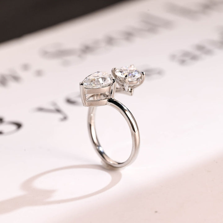 White gold floating pear diamond ring