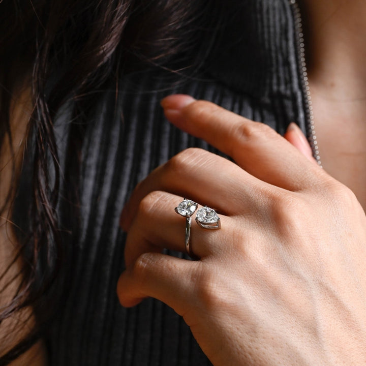 White gold pear and round engagement ring