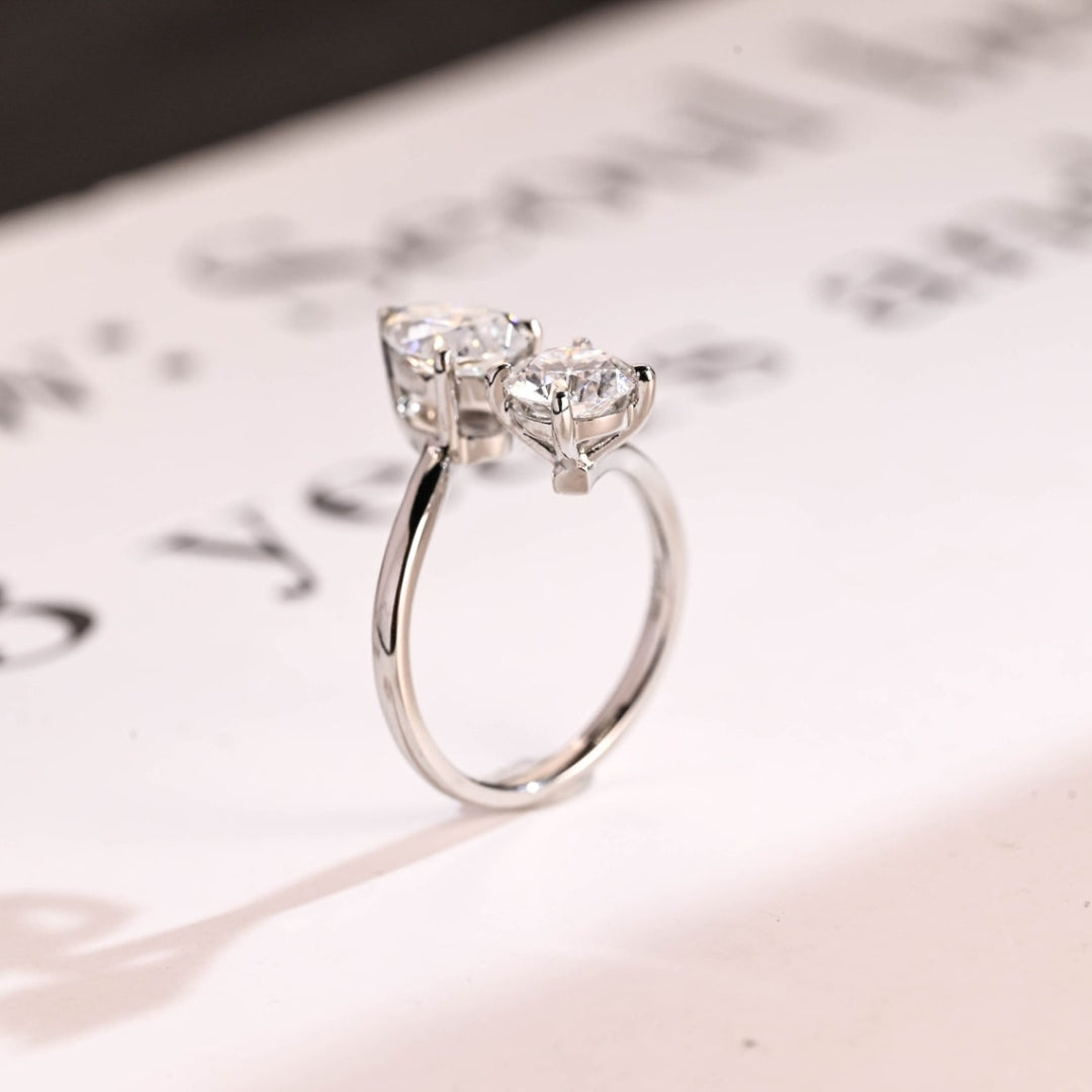 Toi et Moi pear and round diamond ring