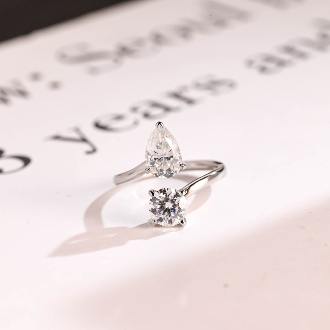 Pear and round vintage diamond ring