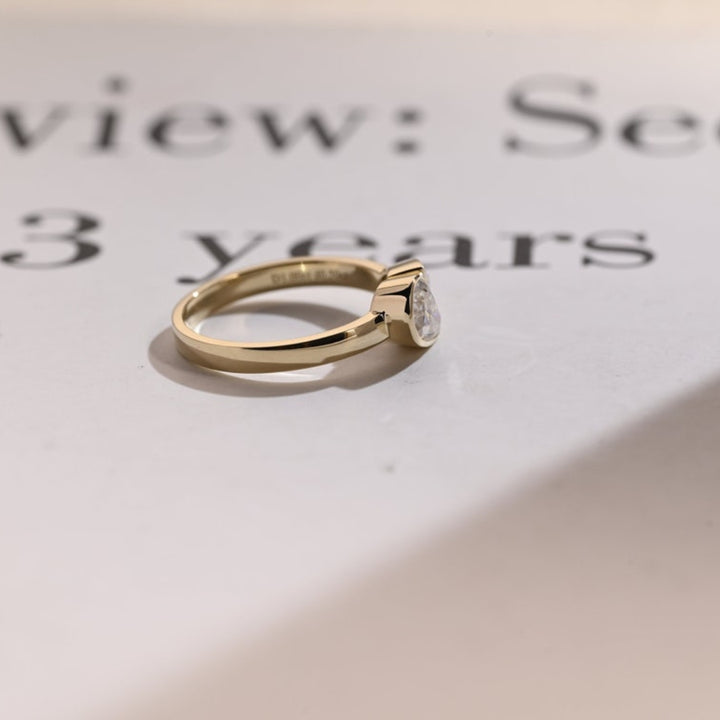 Pear shaped diamond bypass ring