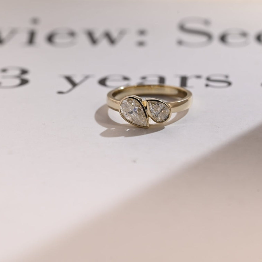 Two pear diamond ring