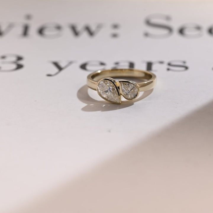 Two pear diamond ring