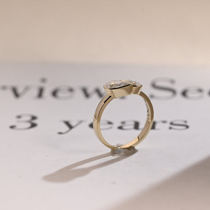 Rose gold pear diamond ring