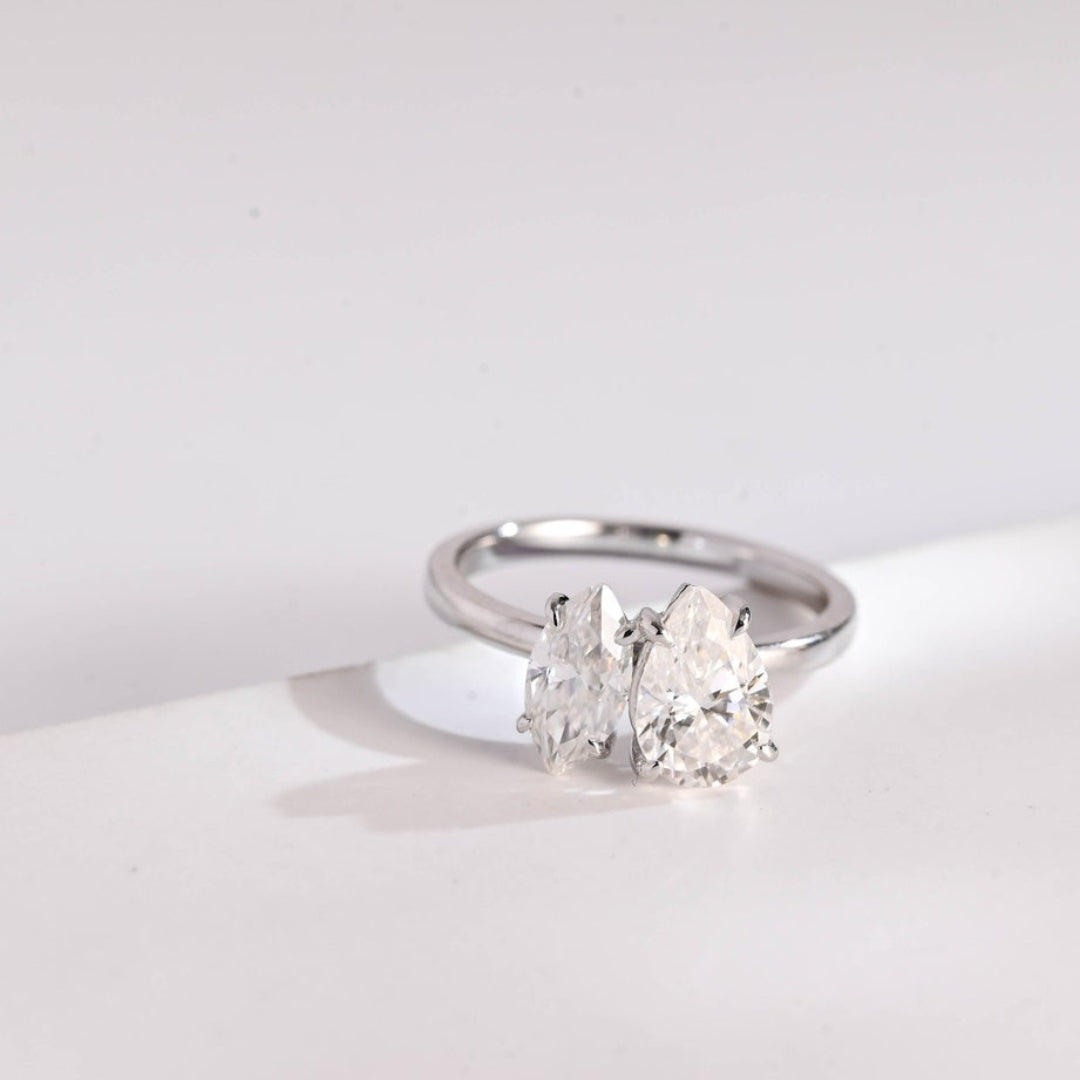 Marquise diamond ring with pear side stones