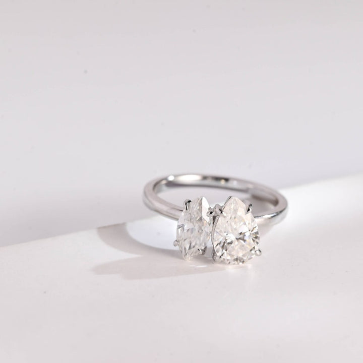 Marquise diamond ring with pear side stones