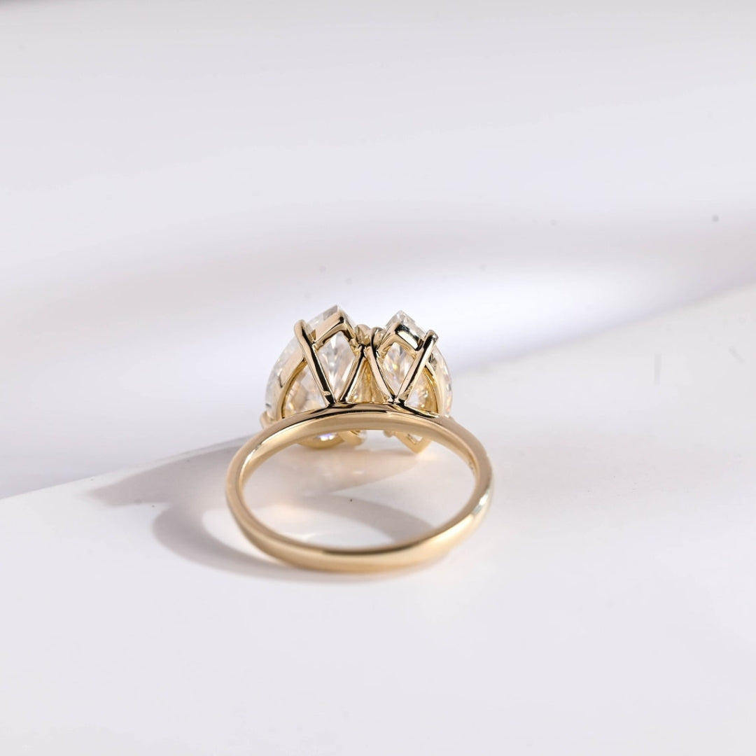 Modern marquise cut ring with pear side accents