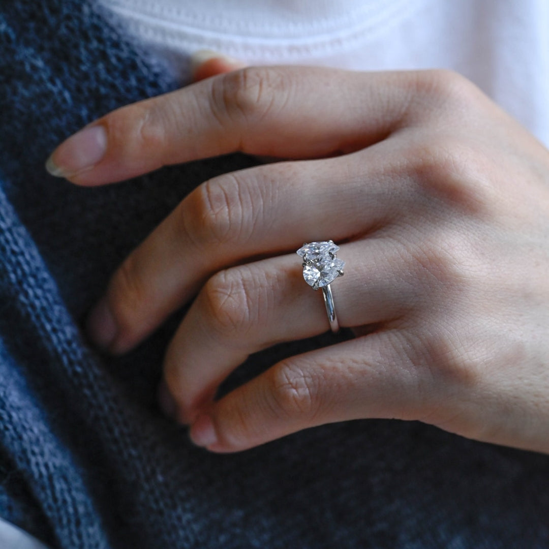 Marquise engagement ring with pear accents