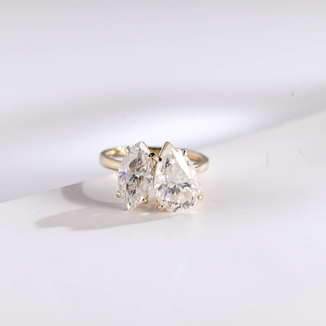 Two stone marquise pear diamond ring