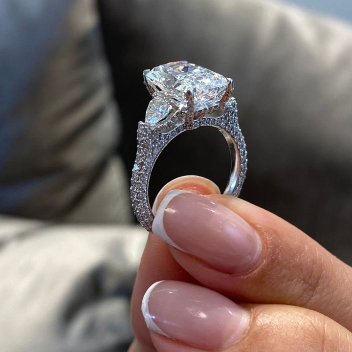 Hidden halo radiant cut ring half moon