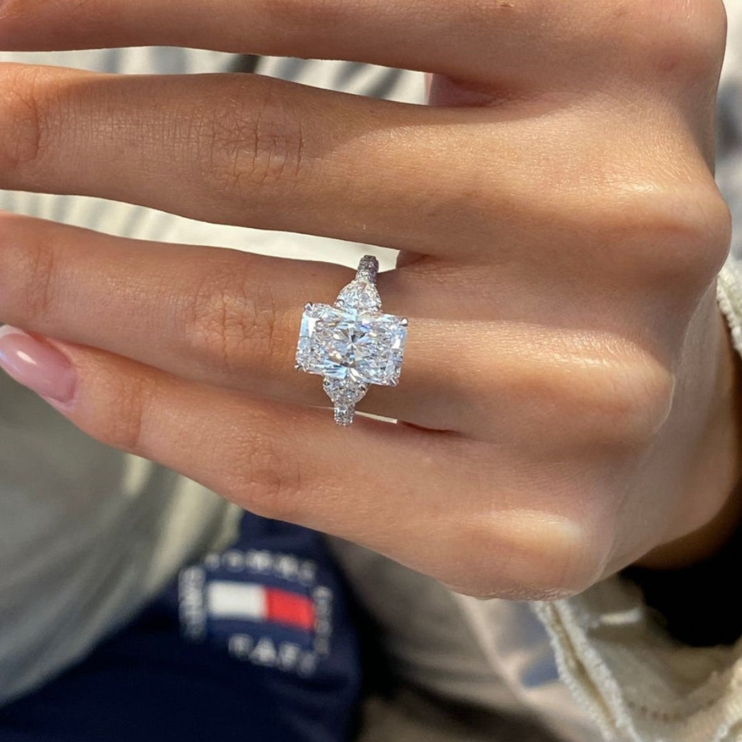 Radiant cut hidden halo engagement ring