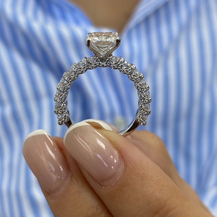Radiant with round side diamond ring