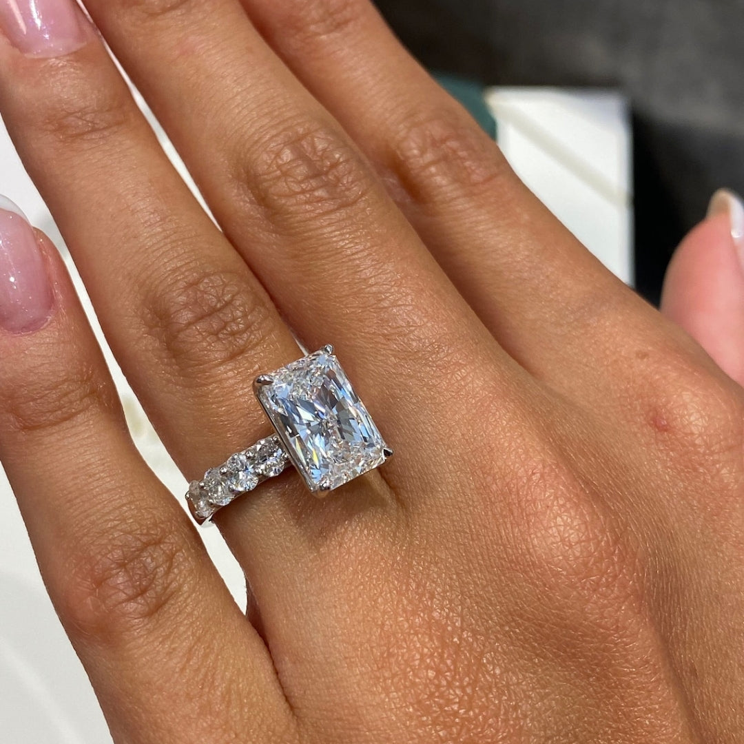 Radiant with round side diamond ring