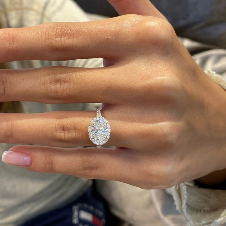 Oval hidden halo diamond ring