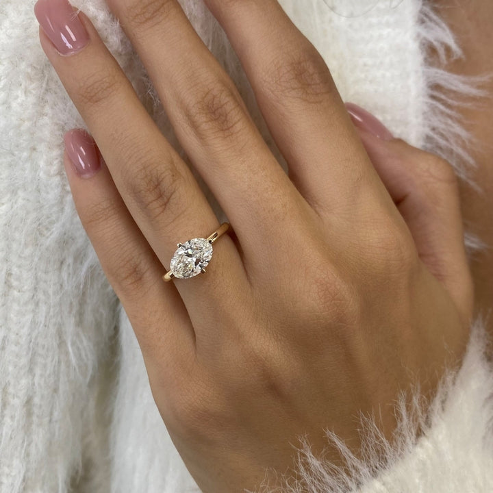 Oval solitaire ring