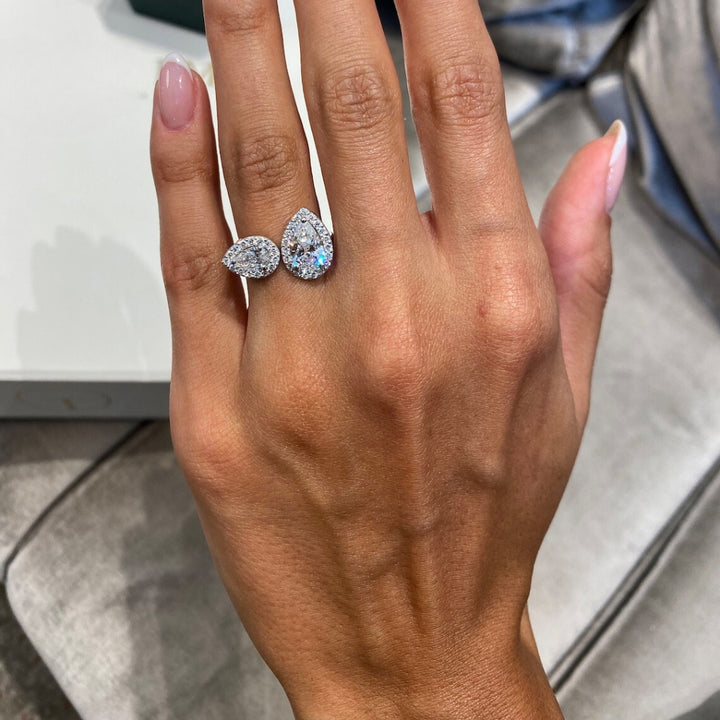 Double pear shaped diamond ring with halo style