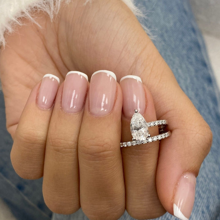 Moissanite pear halo ring