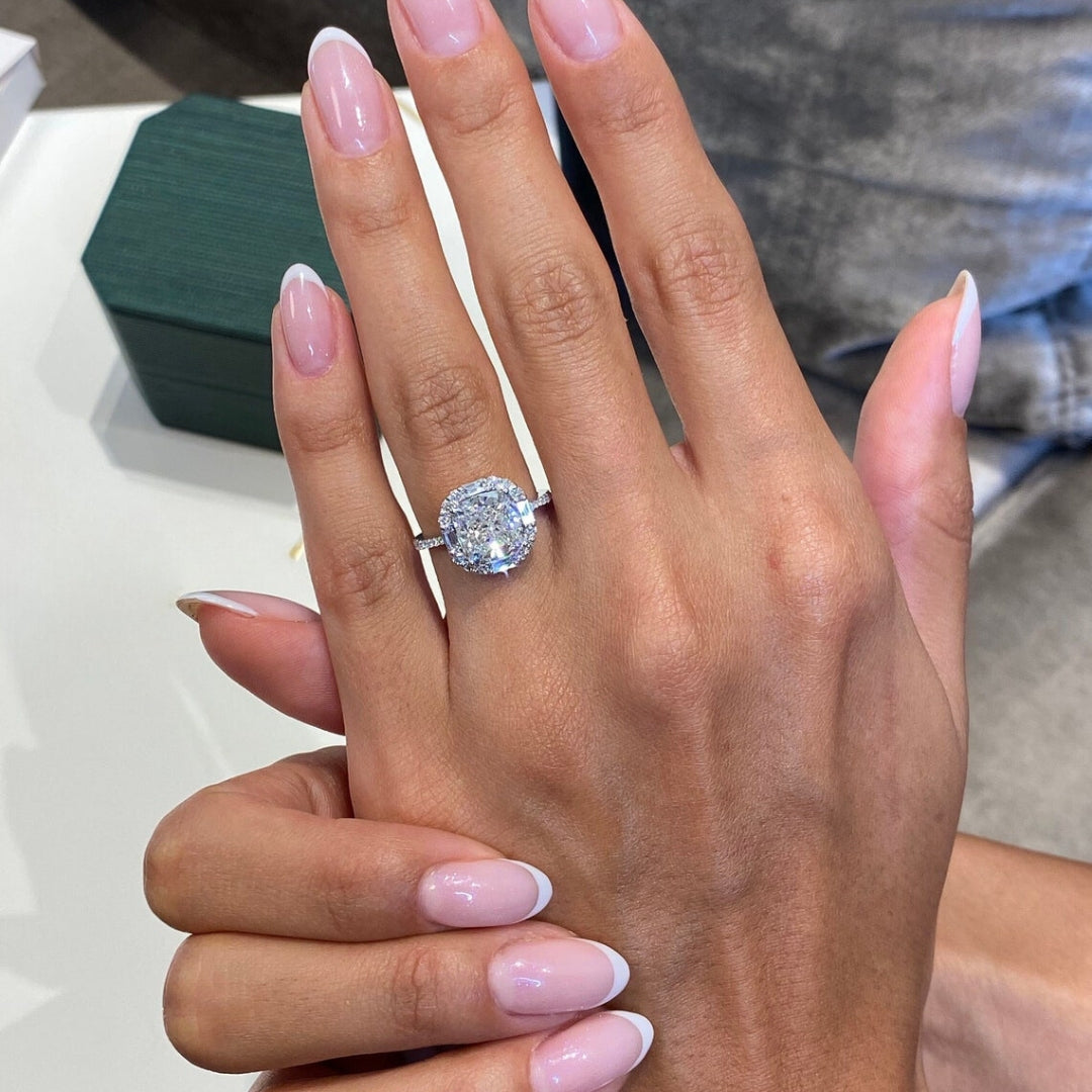 Cushion cut halo engagement ring