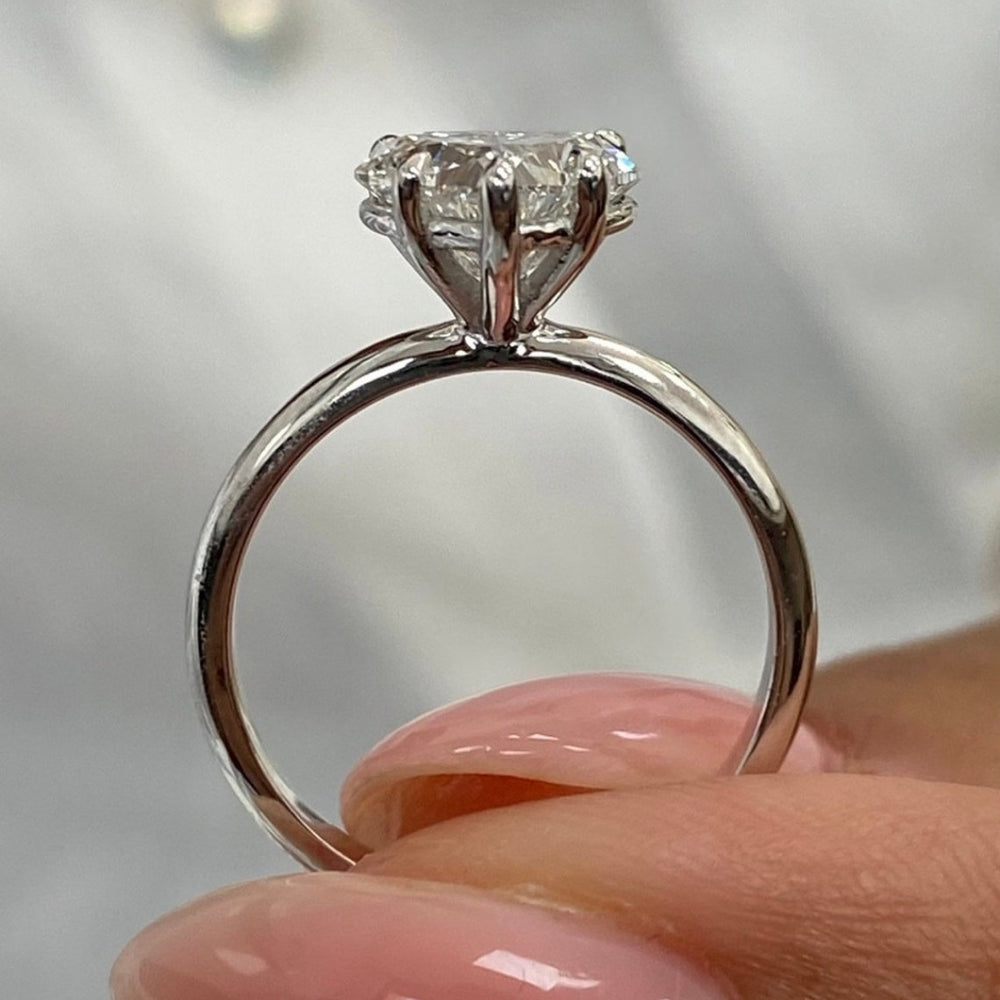 Heart cut solitaire engagement ring