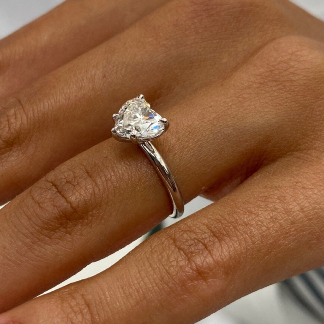 Unique heart solitaire engagement ring