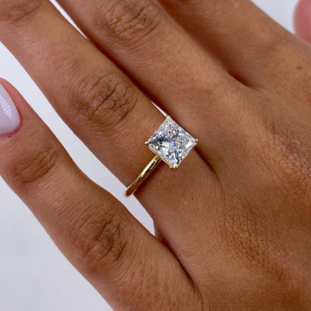 Princess solitaire engagement ring