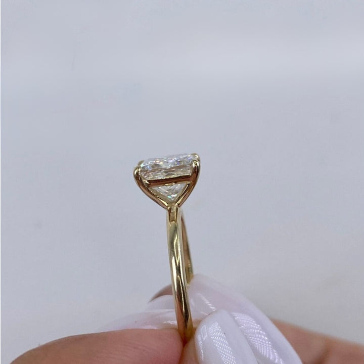 Yellow gold princess cut solitaire ring