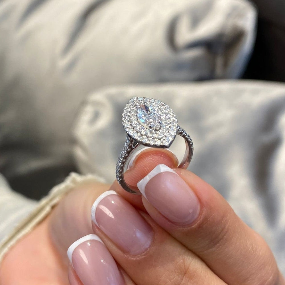 Marquise cut halo engagement ring