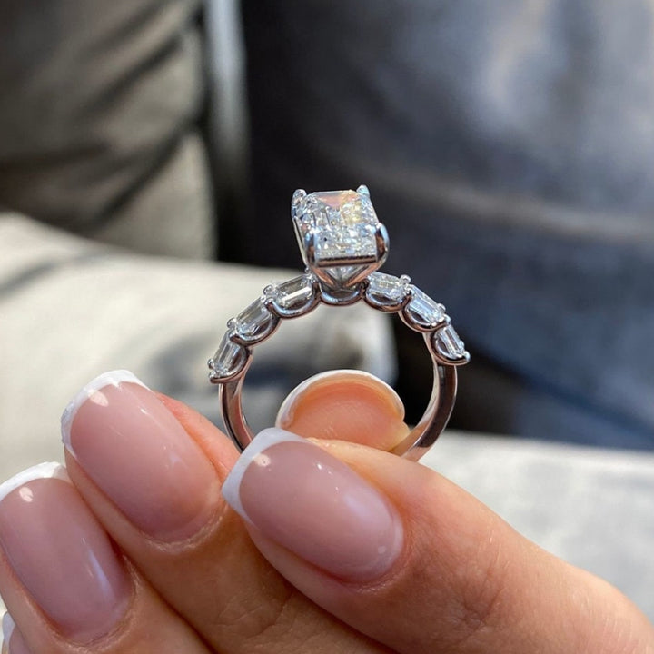 Moissanite emerald diamond ring