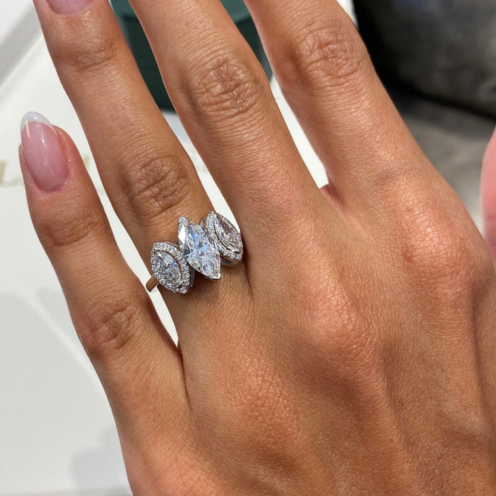 Three stone marquise engagement ring