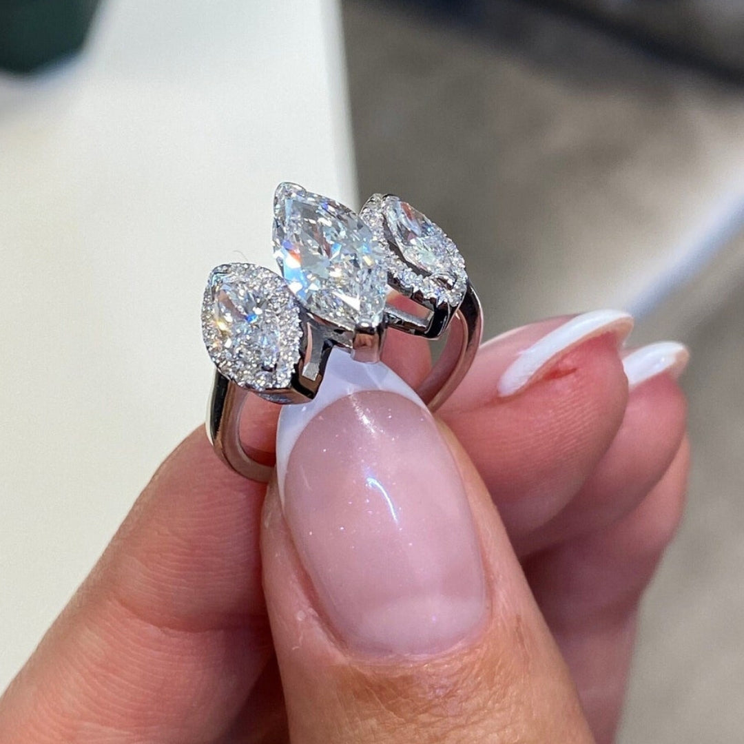 Marquise three stone ring