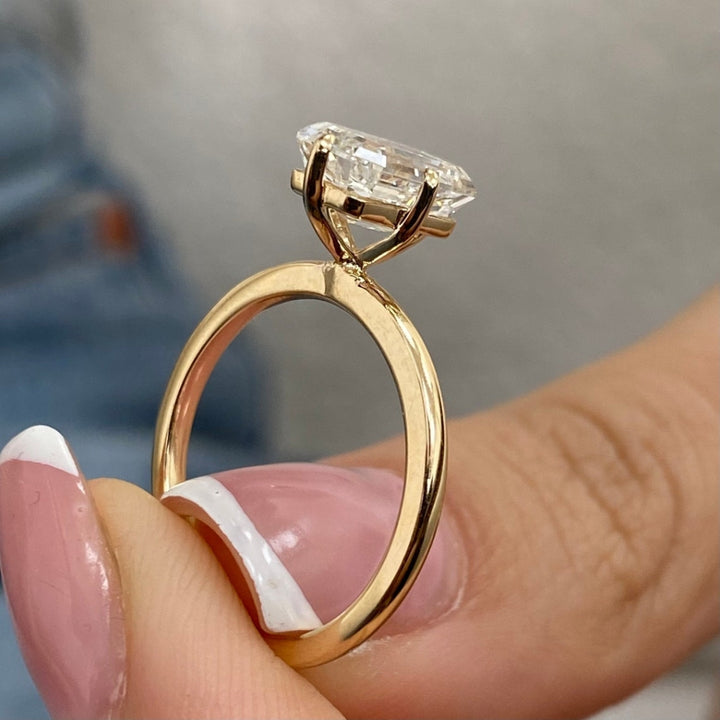 Emerald solitaire ring
