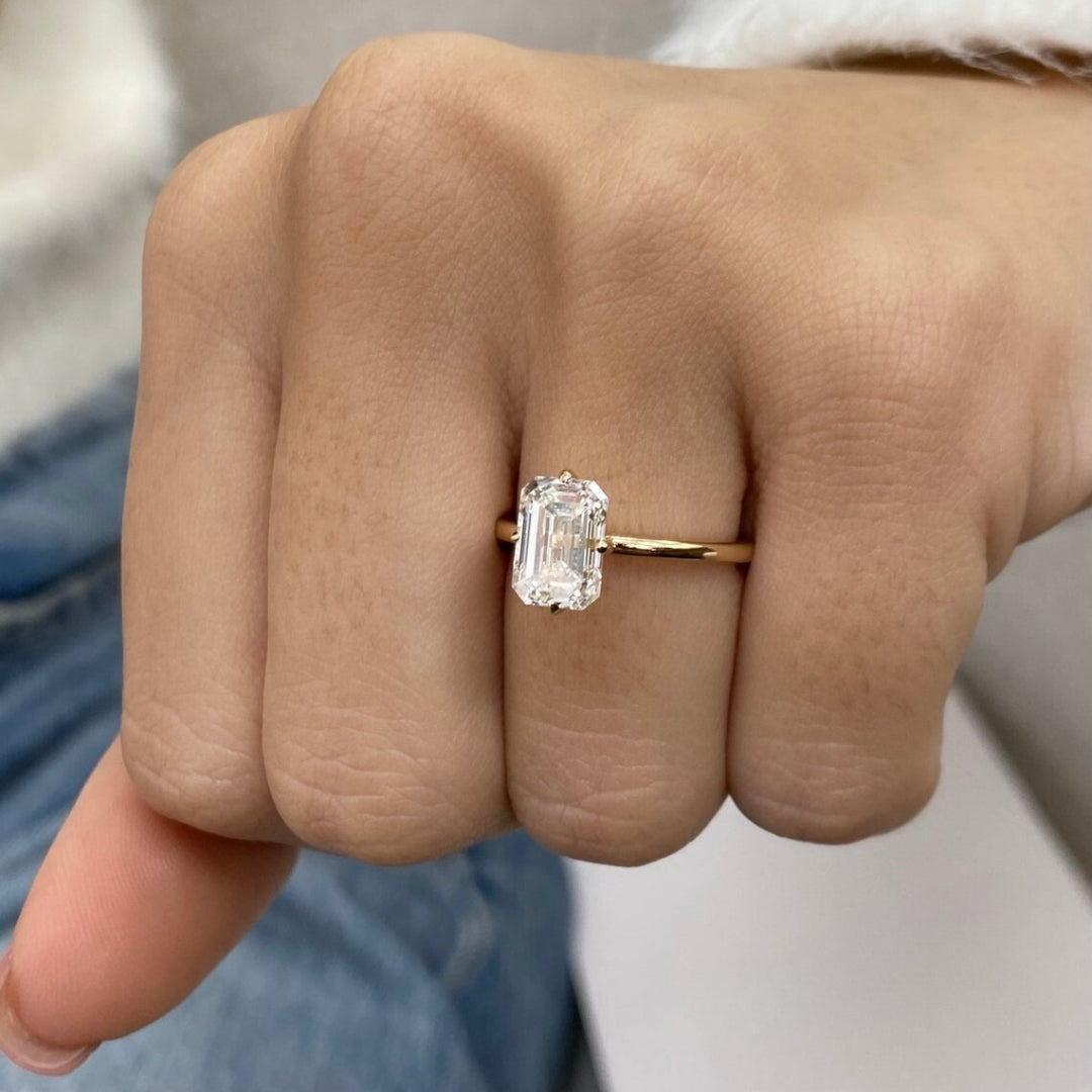 Moissanite emerald diamond ring