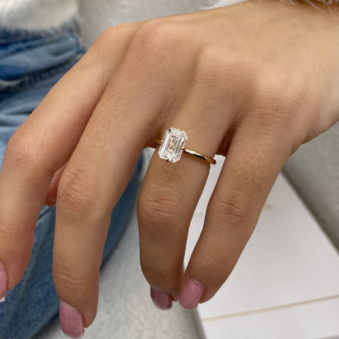 Emerald white diamond solitaire ring