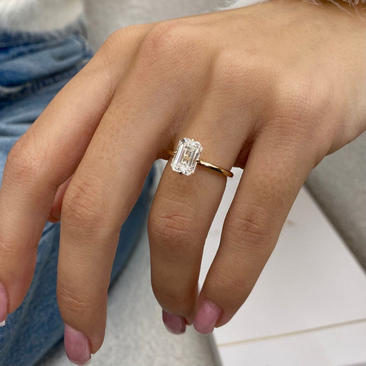 Emerald white diamond solitaire ring