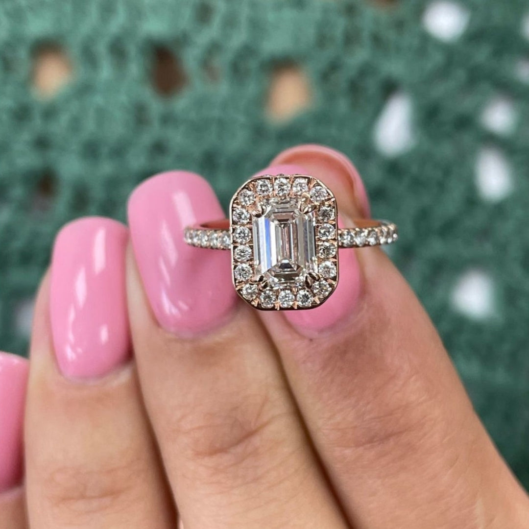 Emerald cut diamond halo ring